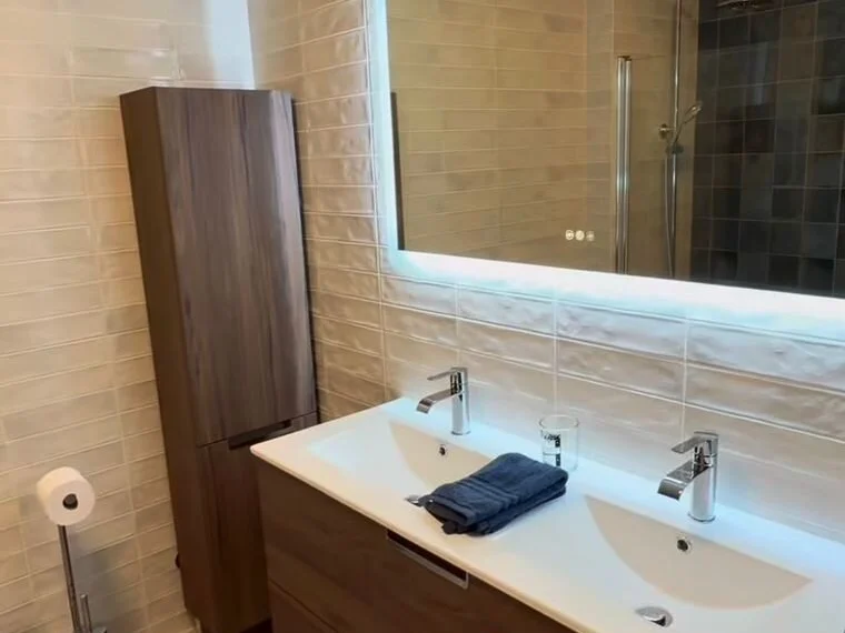 Bathroom with plaster coving and indirect lighting