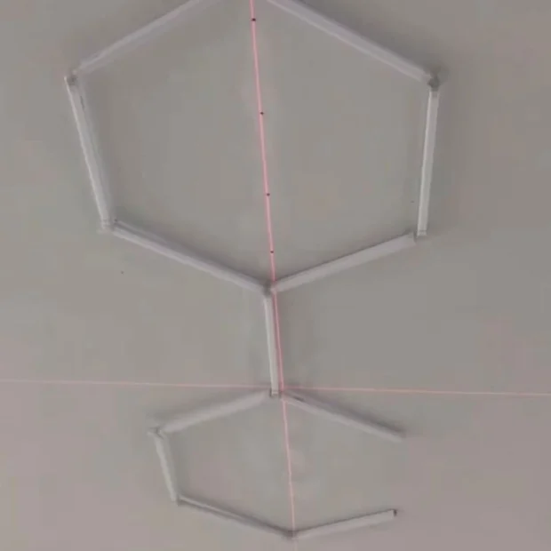 During — laser setting out and building the hexagonal frame