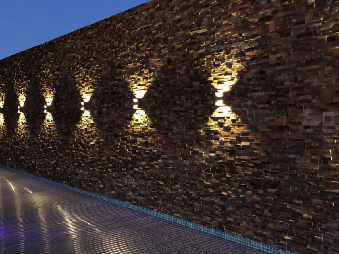 After — stone wall with grazing light