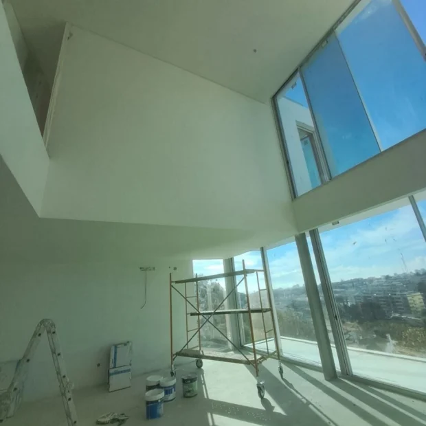 During — finishes in a double-height interior