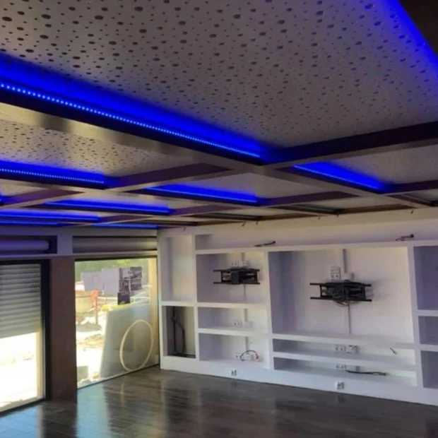 Coffered ceiling with LED lighting and plasterboard shelving