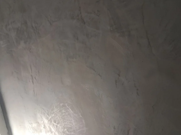 The texture of microcement on a finished wall
