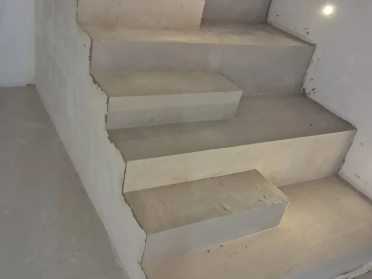 Stair finished in microcement, base coat